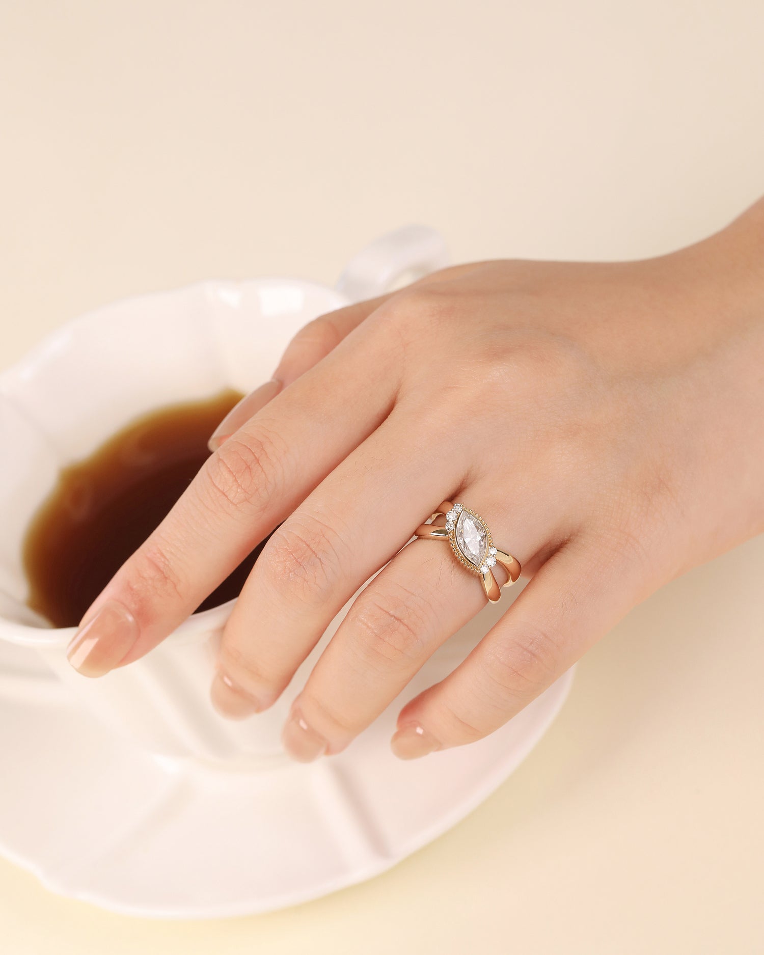 Marquise Halo Ring in Solid Gold