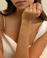 Model wearing Luminous Heart Ring in solid gold with matching heart jewelry.