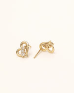 Heart of Freedom Stud Earrings in solid gold showing the back setting and 14K gold engraving.
