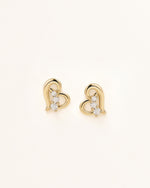 Front view of Heart of Freedom Stud Earrings in solid gold with heart motif and three moissanite stones.