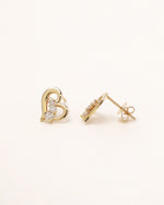 Heart of Freedom Stud Earrings in solid gold shown from the front and side with butterfly backs.