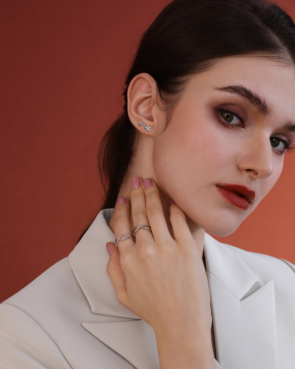 Model wearing cubic zirconia earrings from Chain Chic Earrings Set in 925 sterling silver.