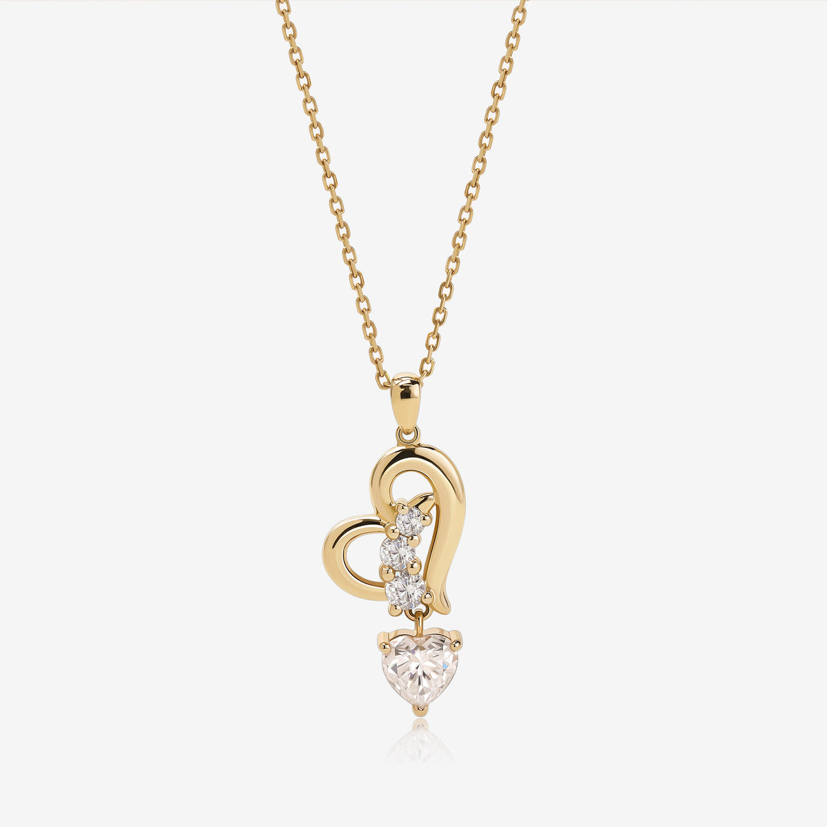 Dancing Heart Necklace in solid gold with heart-shaped moissanite pendant.