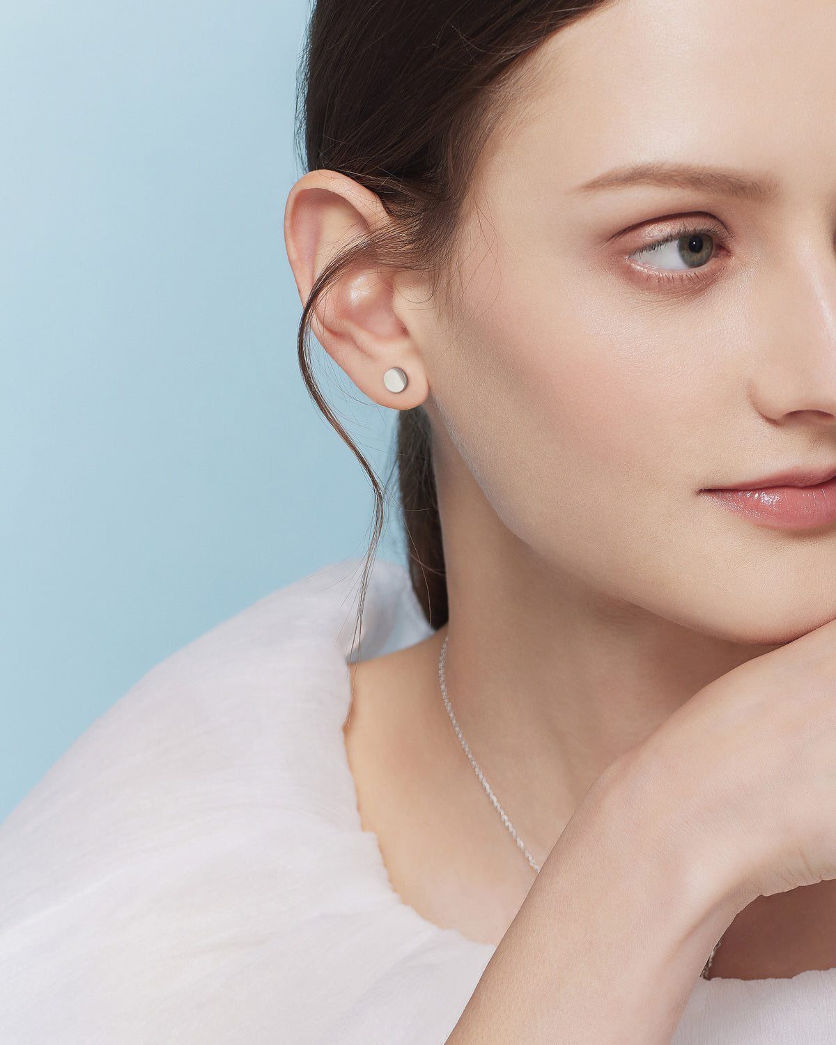 Model wearing round disc earring from Chain Chic Earrings Set in 925 sterling silver.