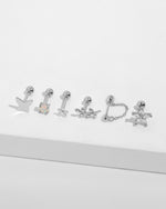 Spring Meadow Earrings Set in 925 sterling silver displayed with butterfly, opal, flower, leaf and cubic zirconia designs.