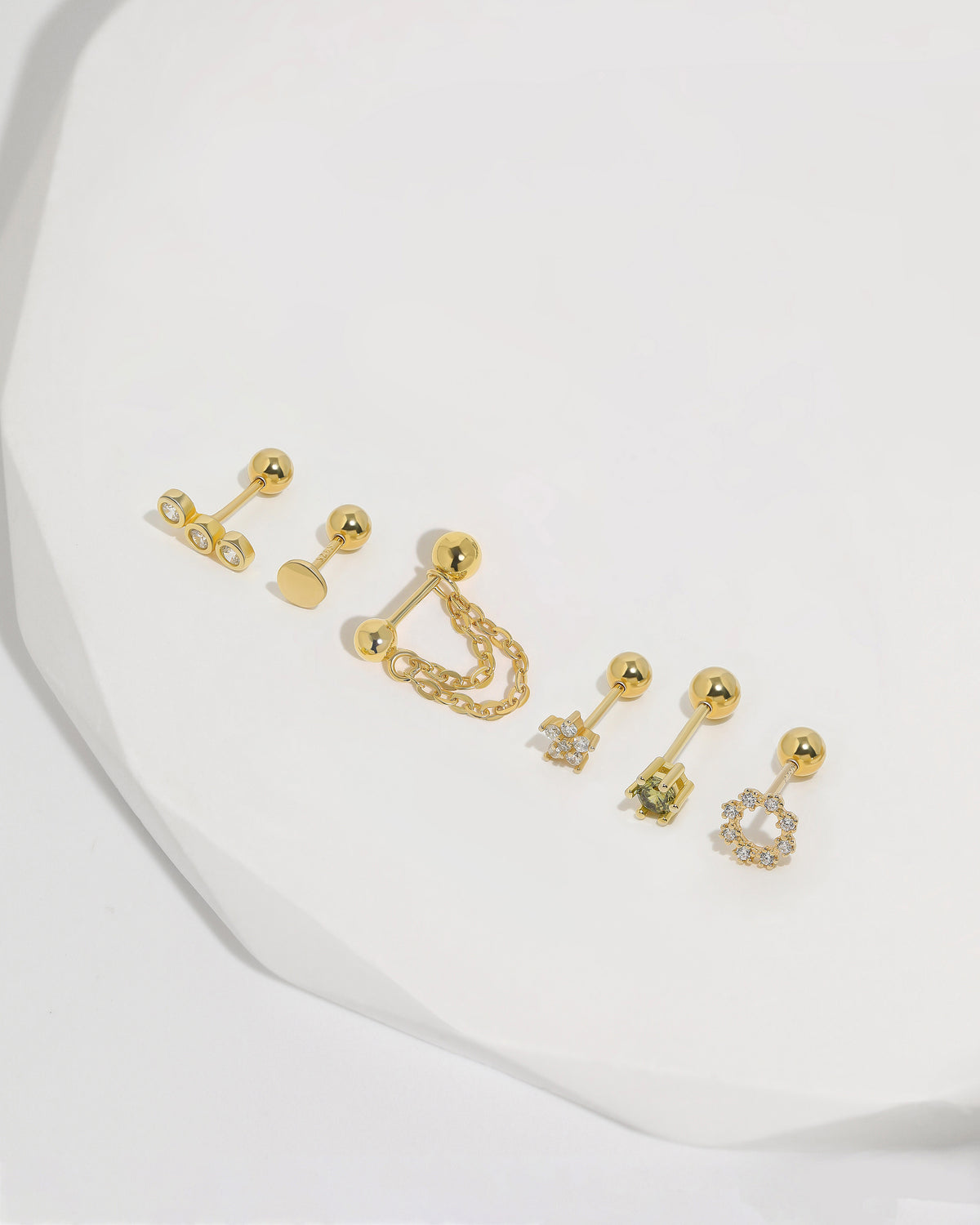 Minimalist Touch Earrings Set in 925 sterling silver with ball backs, chain detail and cubic zirconia accents.