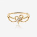 Wings of the Heart Ring in solid gold with an open heart design, moissanite stones and delicate double band details.
