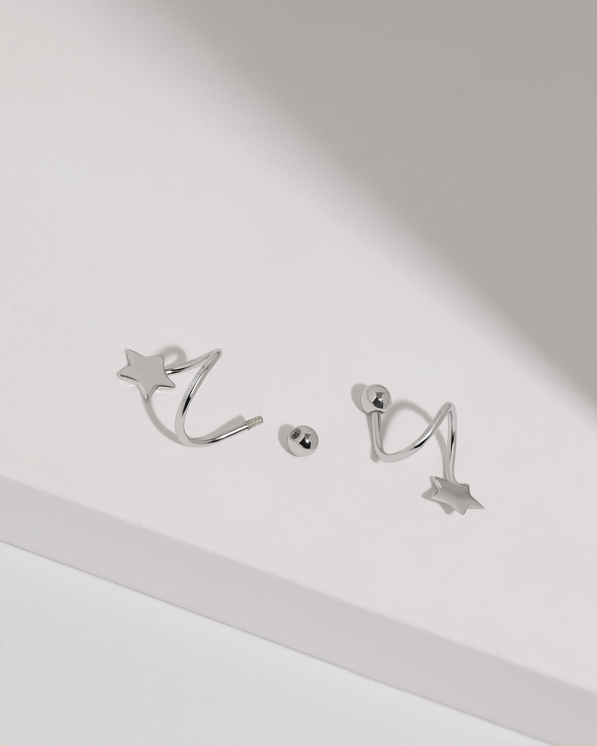 18K Solid Gold Star Spiral Screw Back Earrings shown with removable screw ball back and threaded spiral post design.