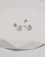 Pair of silver Meissa Bunny Sparkle Screw Back Earrings shown with threaded posts and removable round screw backs on a white surface.