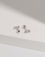 Twist Bar Screw Back Earrings in 925 sterling silver arranged at different angles to show the sculpted twist design and round screw back closures.