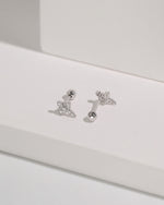 Pair of silver Cross Sparkle Screw Back Earrings displayed on a white surface with sparkling cubic zirconia cross designs and round screw backs.