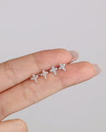 Silver Cross Sparkle Screw Back Earrings shown from front and back angles, highlighting the detailed cubic zirconia setting and screw back construction.