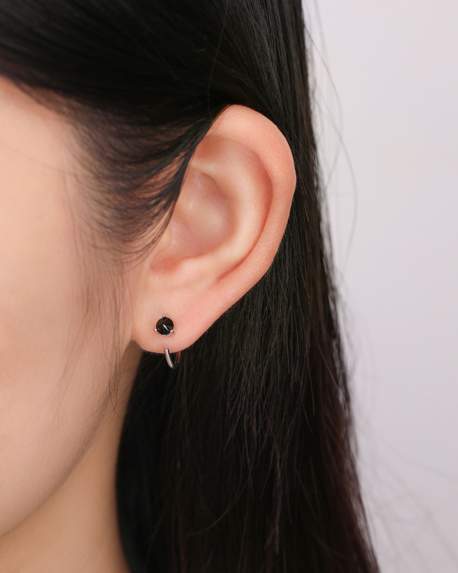 Midnight Huggie Hoop Earrings in Solid Gold
