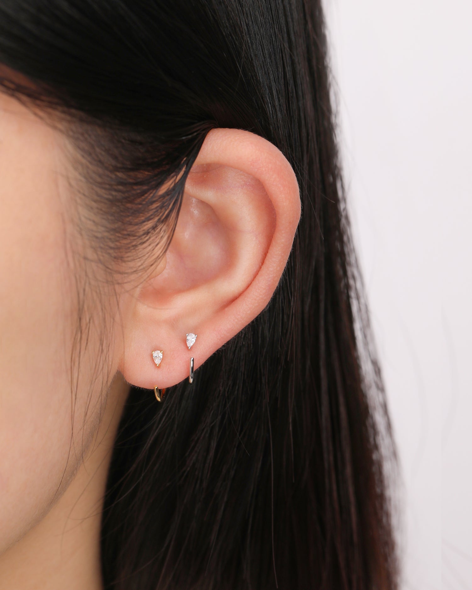 Pear Sparkle Huggie Hoop Earrings in Solid Gold