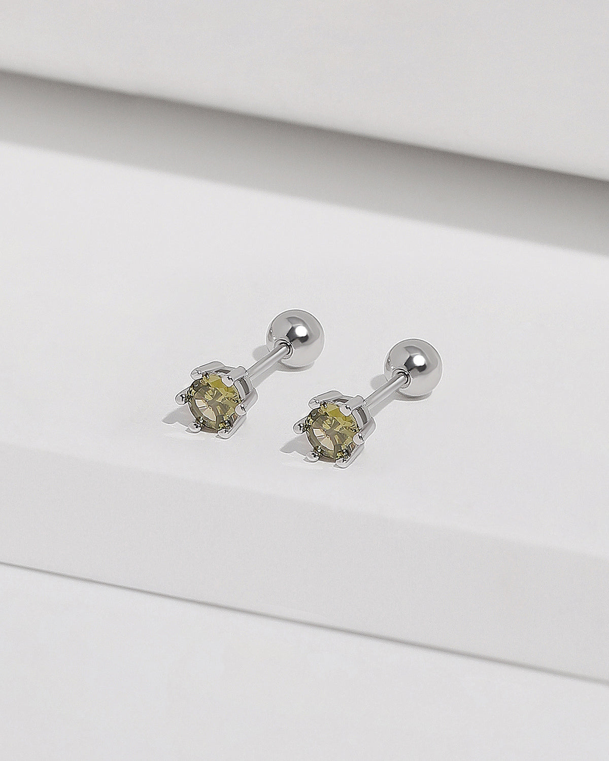 Green cubic zirconia stud earrings from Chain Chic Earrings Set in 925 sterling silver with ball backs.