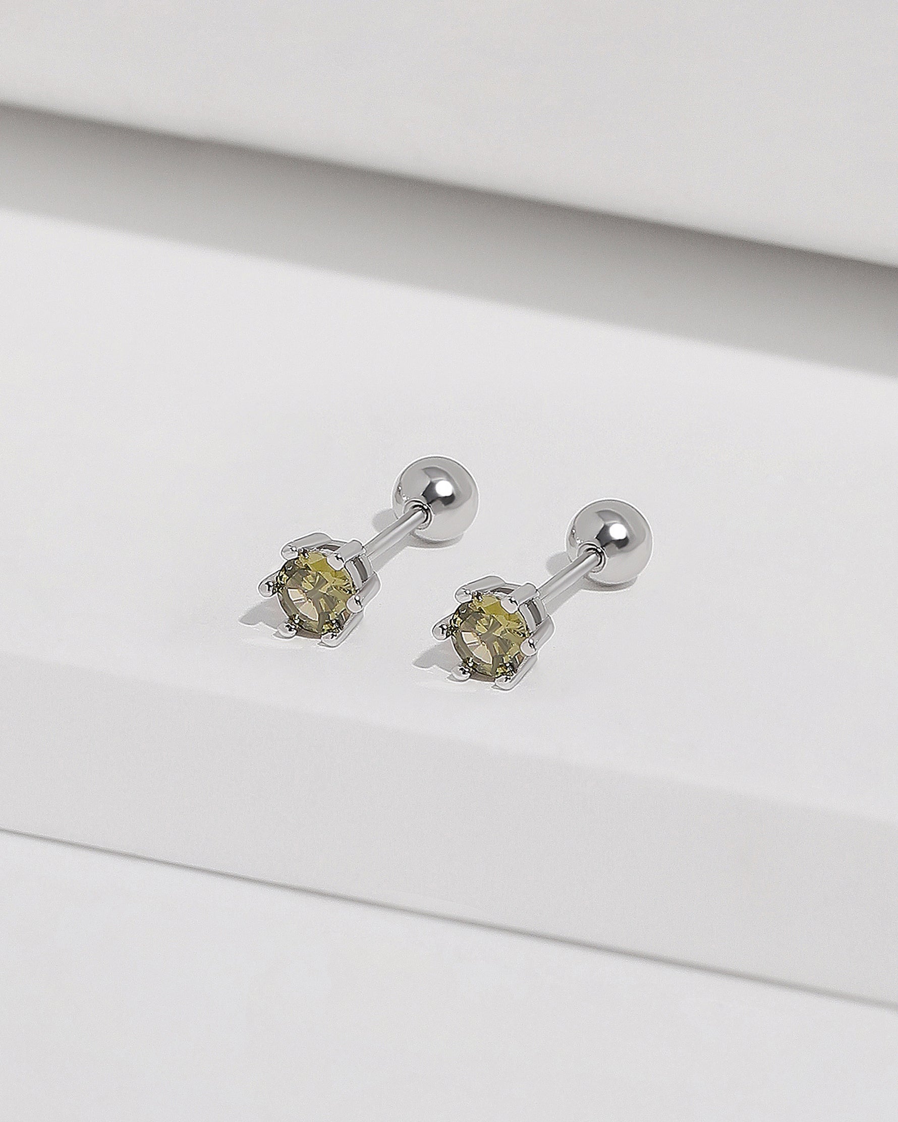 Green cubic zirconia stud earrings from Chain Chic Earrings Set in 925 sterling silver with ball backs.